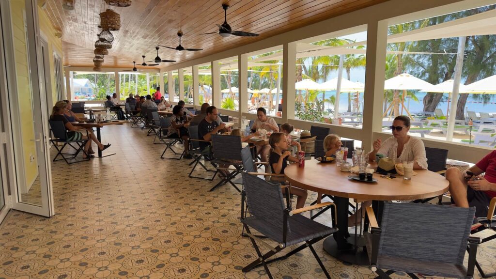 People enjoying their time in Rum Point Club Solis restaurant